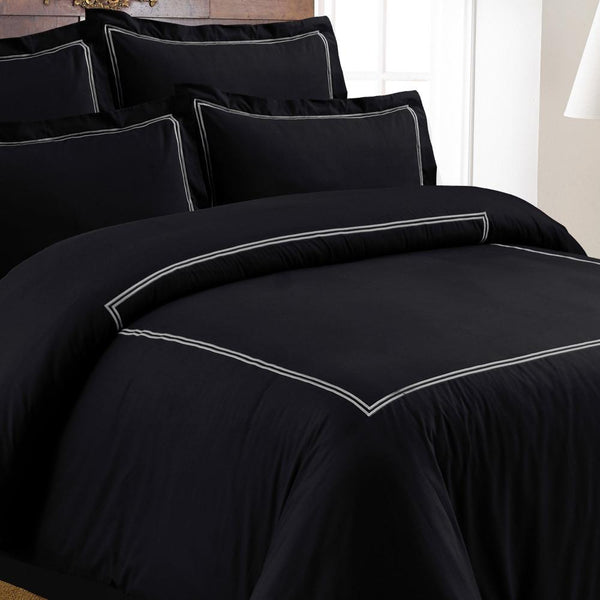 Black Baratta Stich luxury Duvet Cover made from premium cotton, including a king Duvet Cover and pillow cases. Perfect for elegant bedding, available online in Pakistan